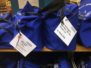 Photo of blue book club kit bags